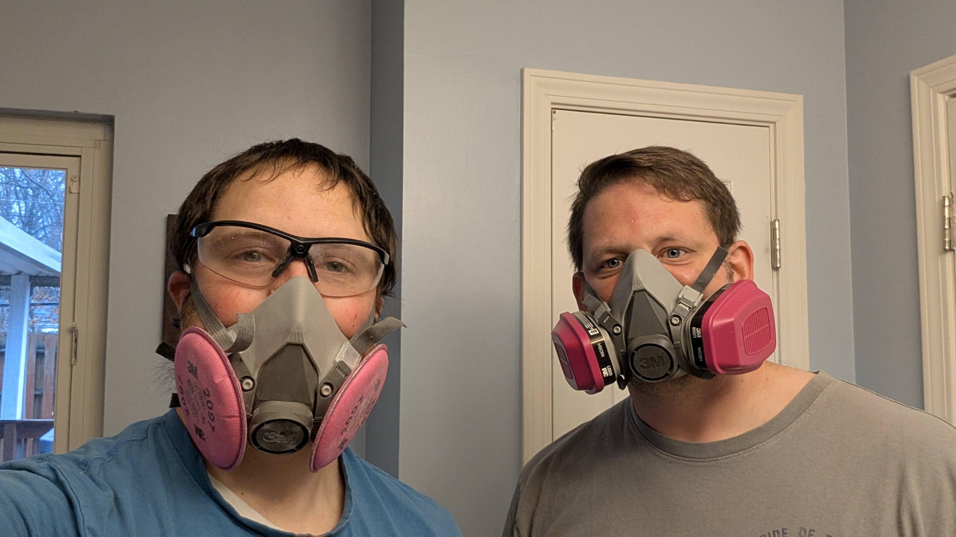 Henry Brothers HVAC technicians wearing 3M respirator masks at Oak Park Clark County job site