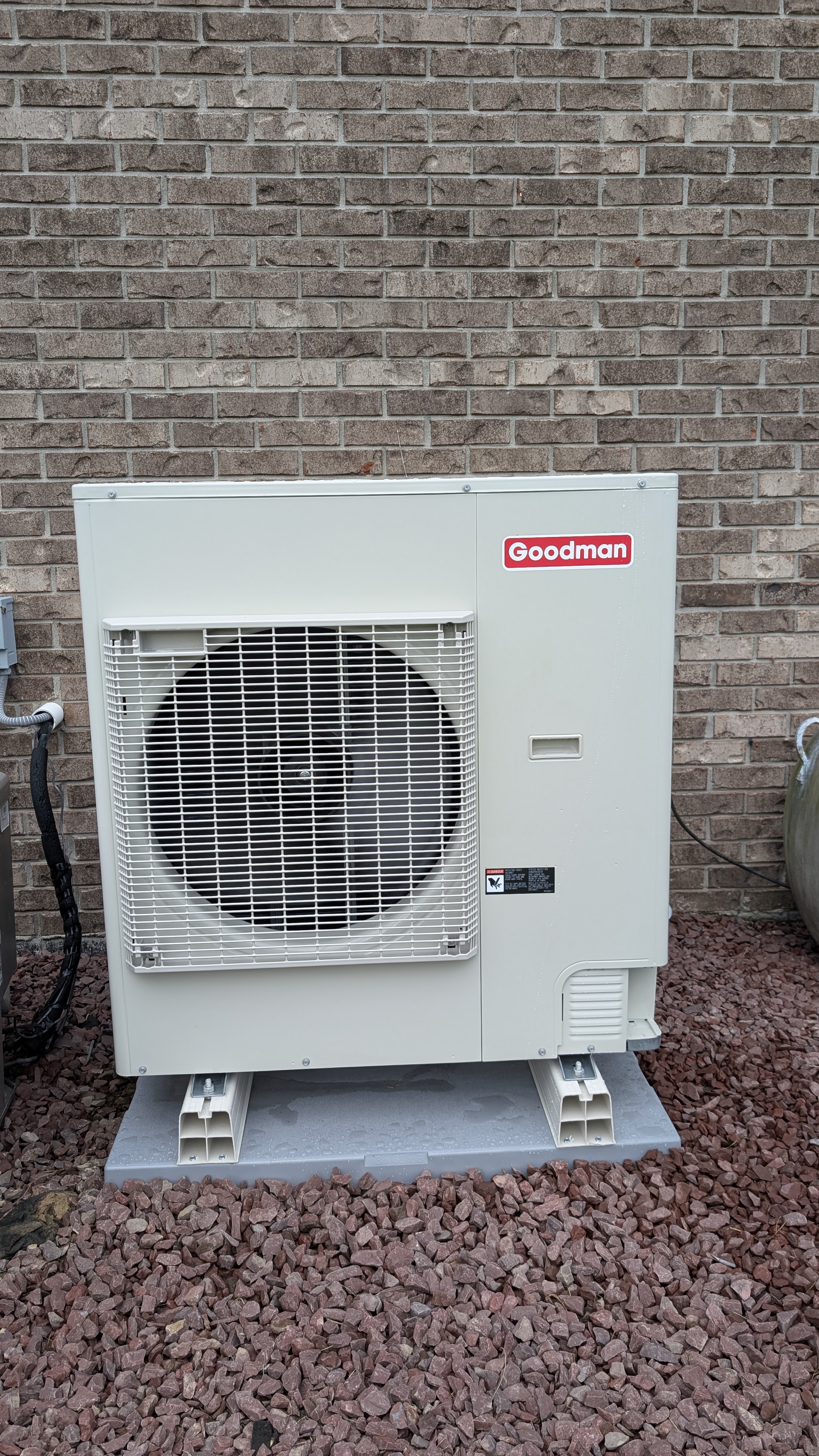 New Goodman mini-split outdoor condenser unit installed on pad Clark County Indiana after installation