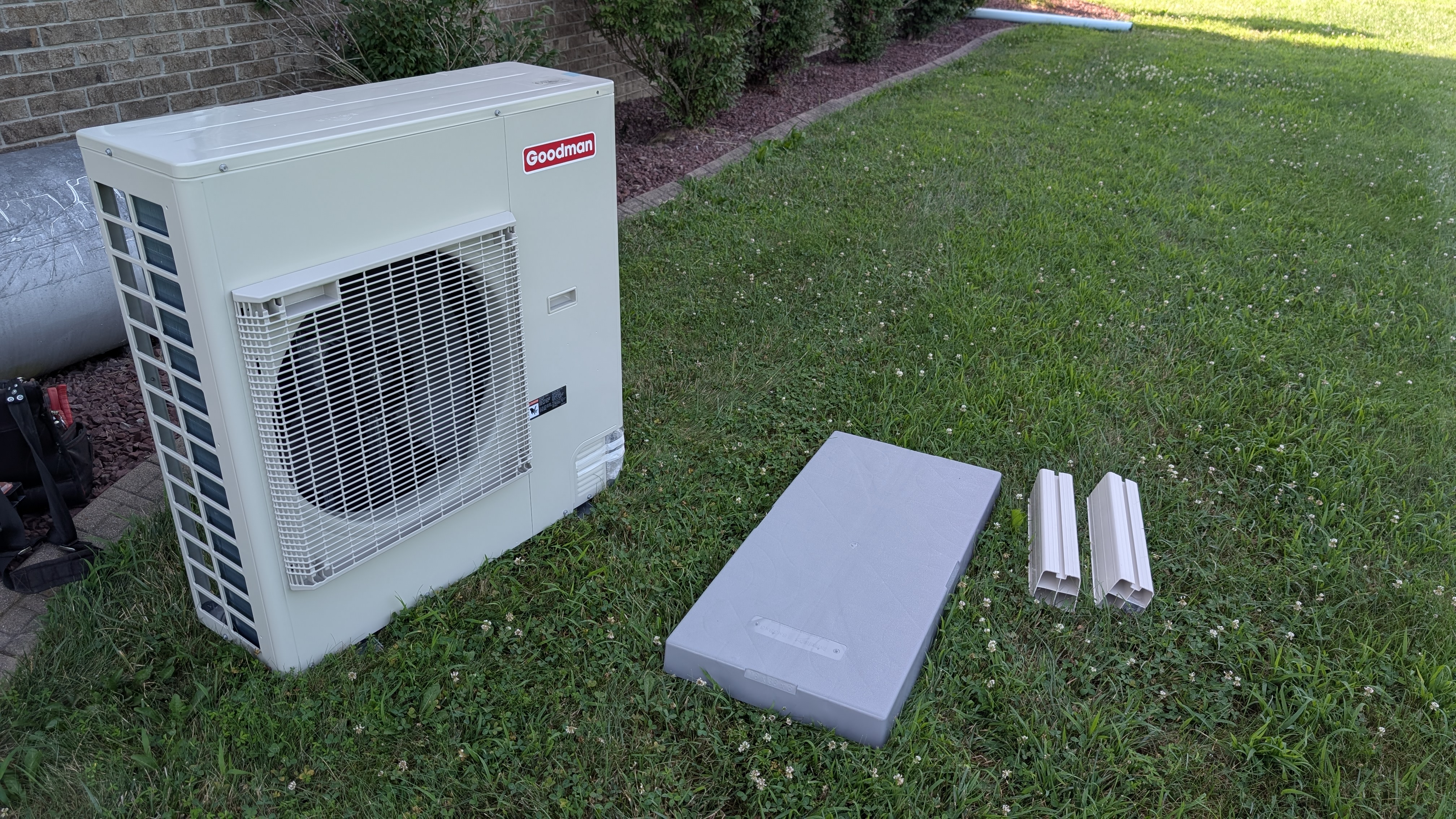 Goodman mini-split outdoor condenser and indoor wall-mount head unit staged before installation Clark County Indiana