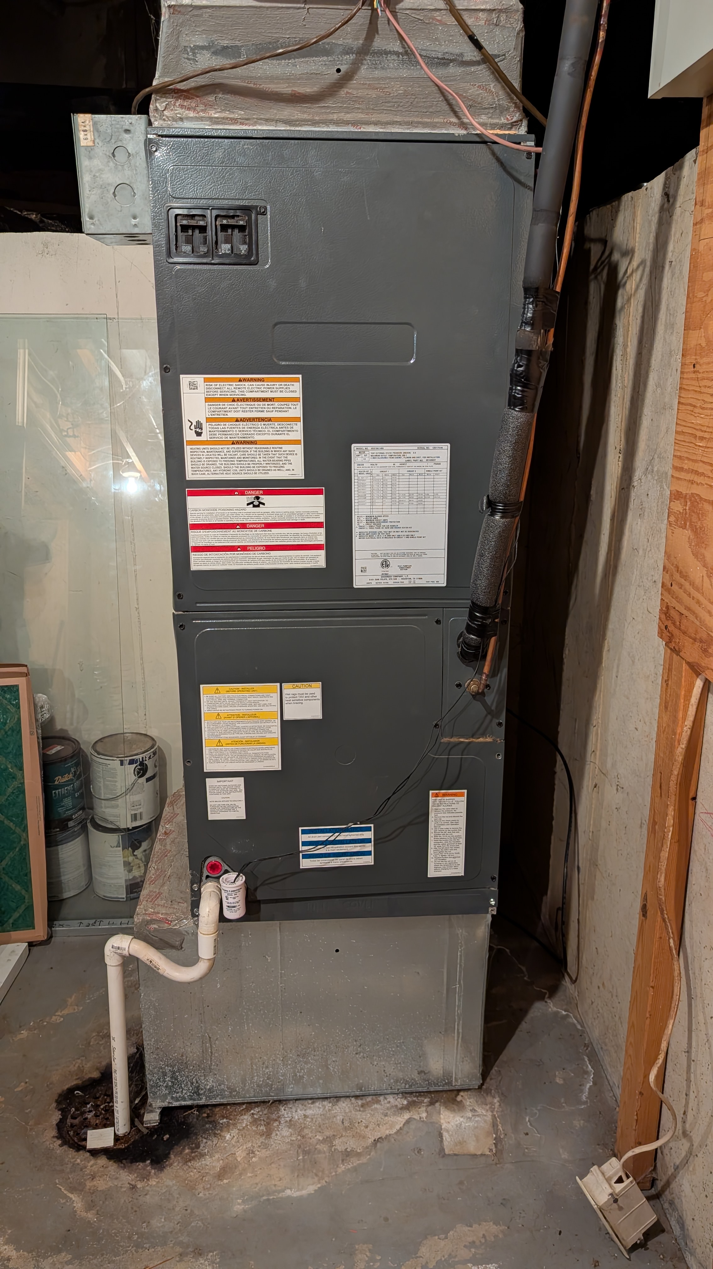 Older air handler unit in basement before new HVAC installation