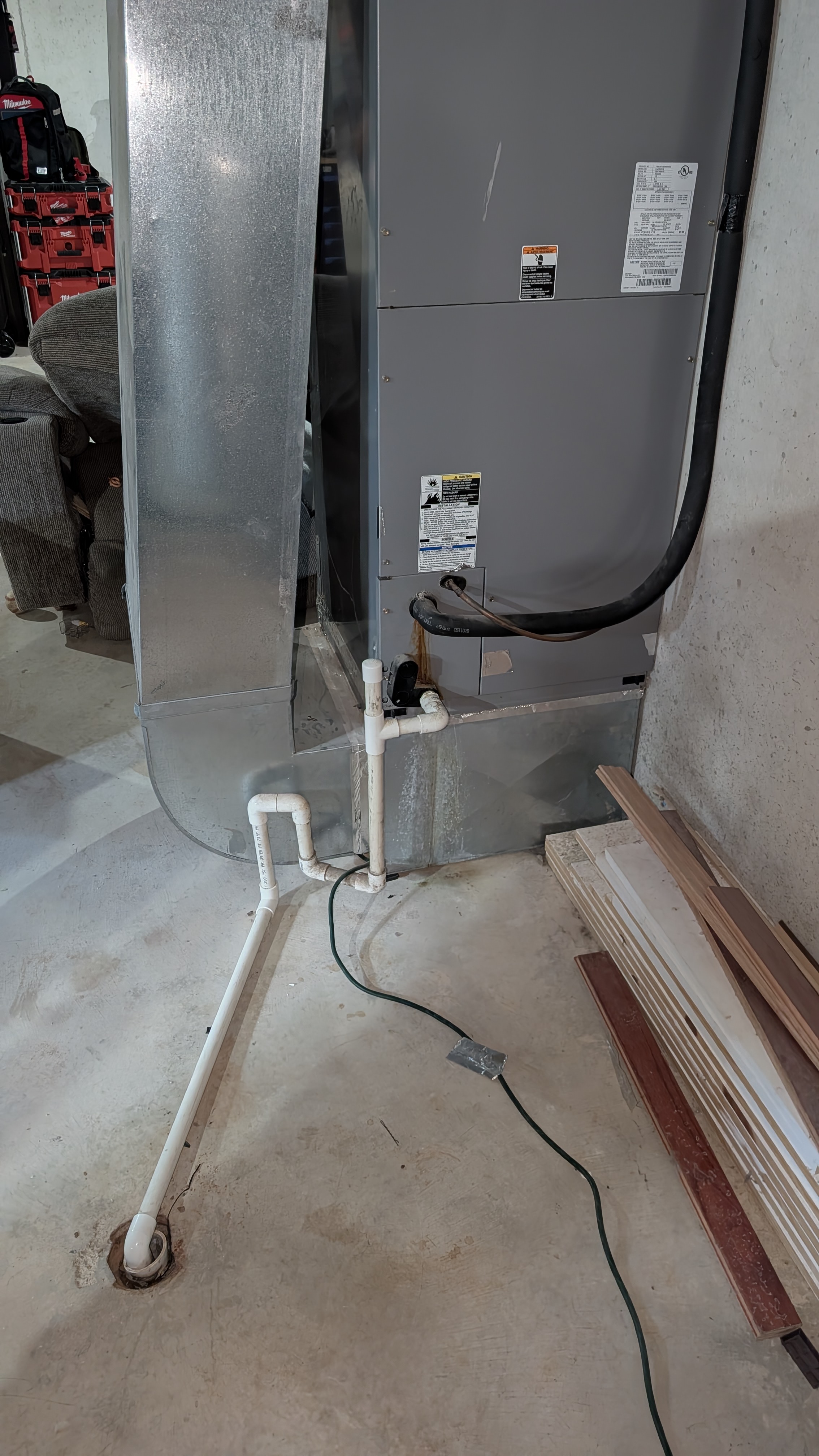 Bryant air handler and condensate drain in the basement before second-opinion inspection, Memphis Indiana