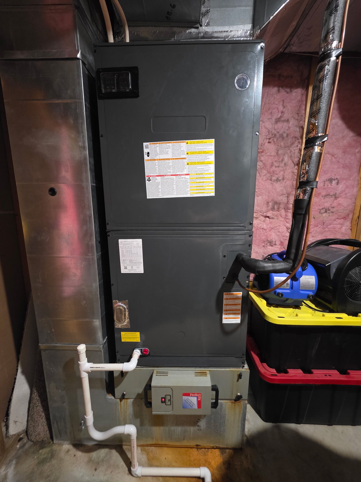 Existing air handler unit in basement utility space during HVAC second opinion inspection