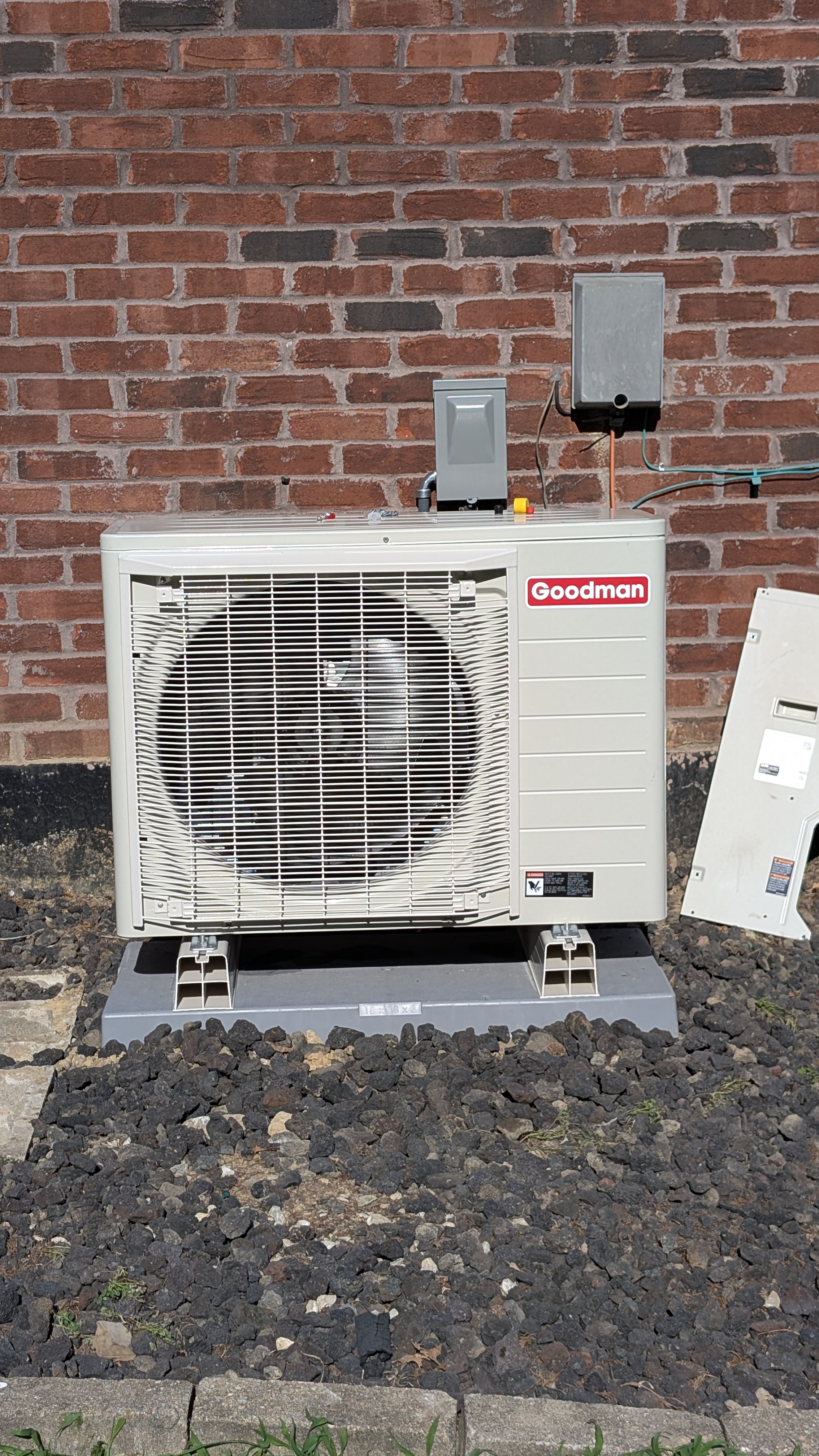 Installed Goodman mini-split heat pump outdoor unit on mounting pad Memphis Indiana