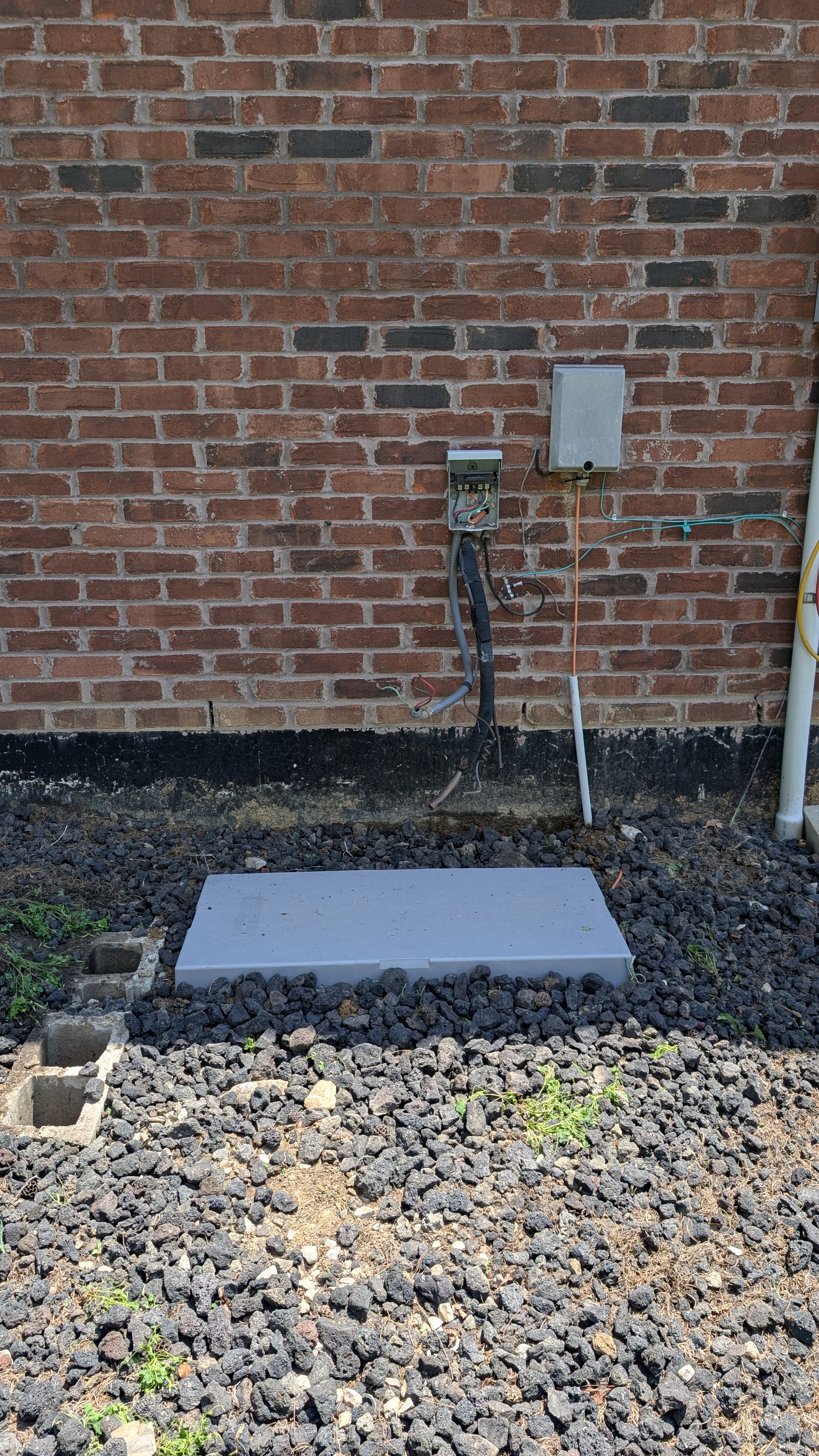 New concrete mounting pad set for mini-split outdoor unit installation Memphis Indiana