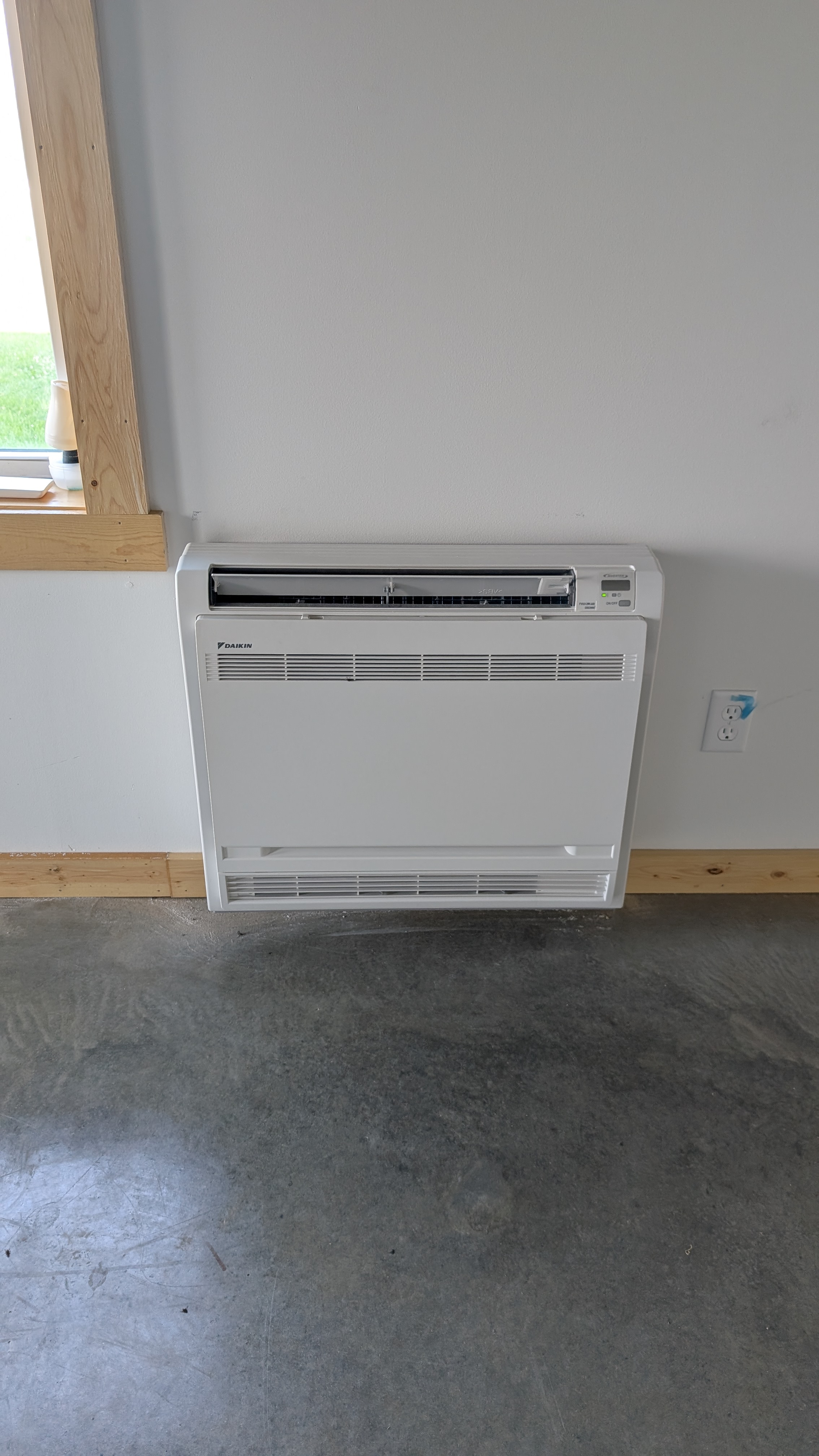 Daikin floor-console mini-split indoor unit installed in new pole barn building Washington County Indiana