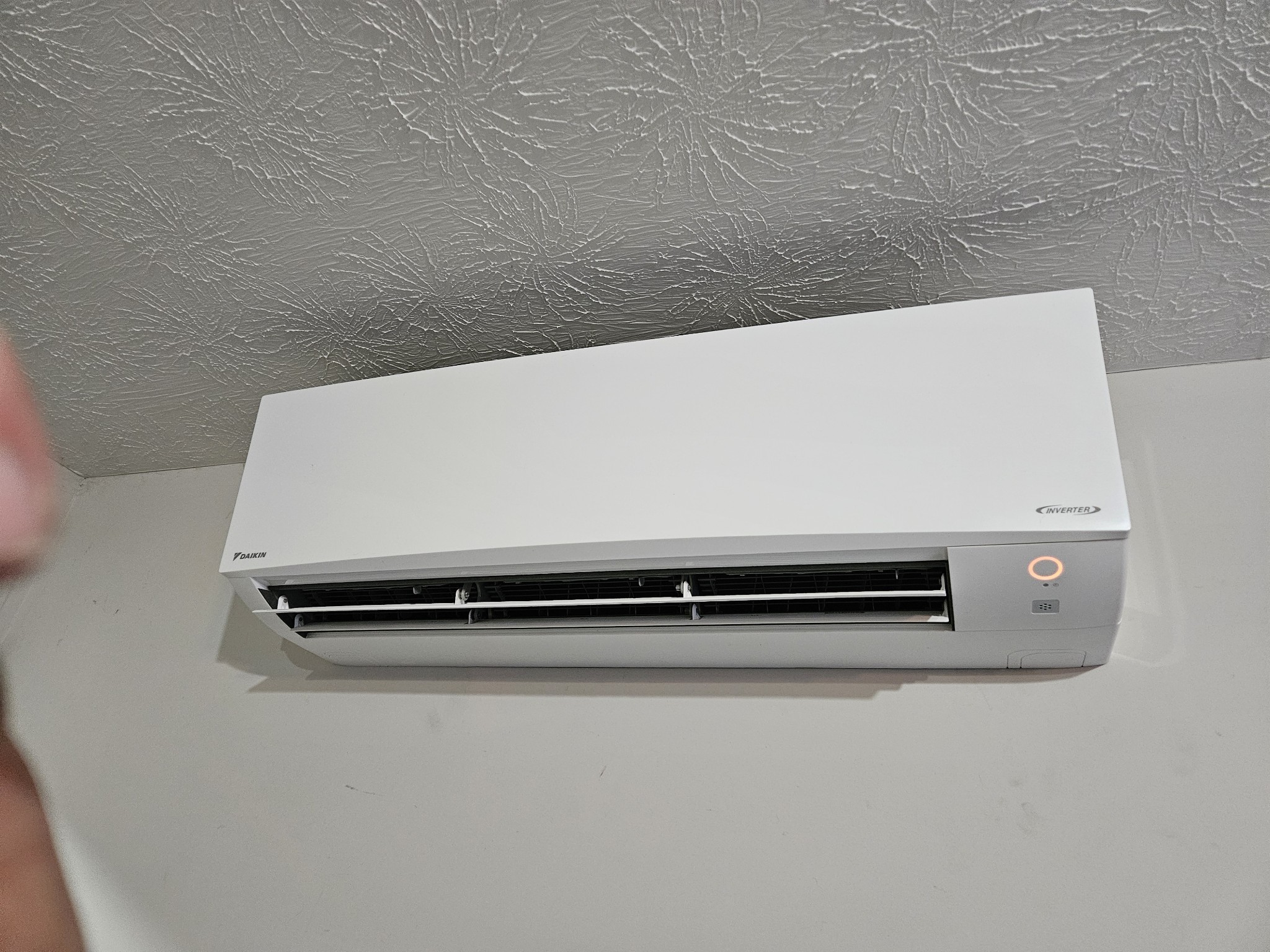 Daikin Inverter mini-split indoor wall unit installed in room with textured ceiling southern Indiana