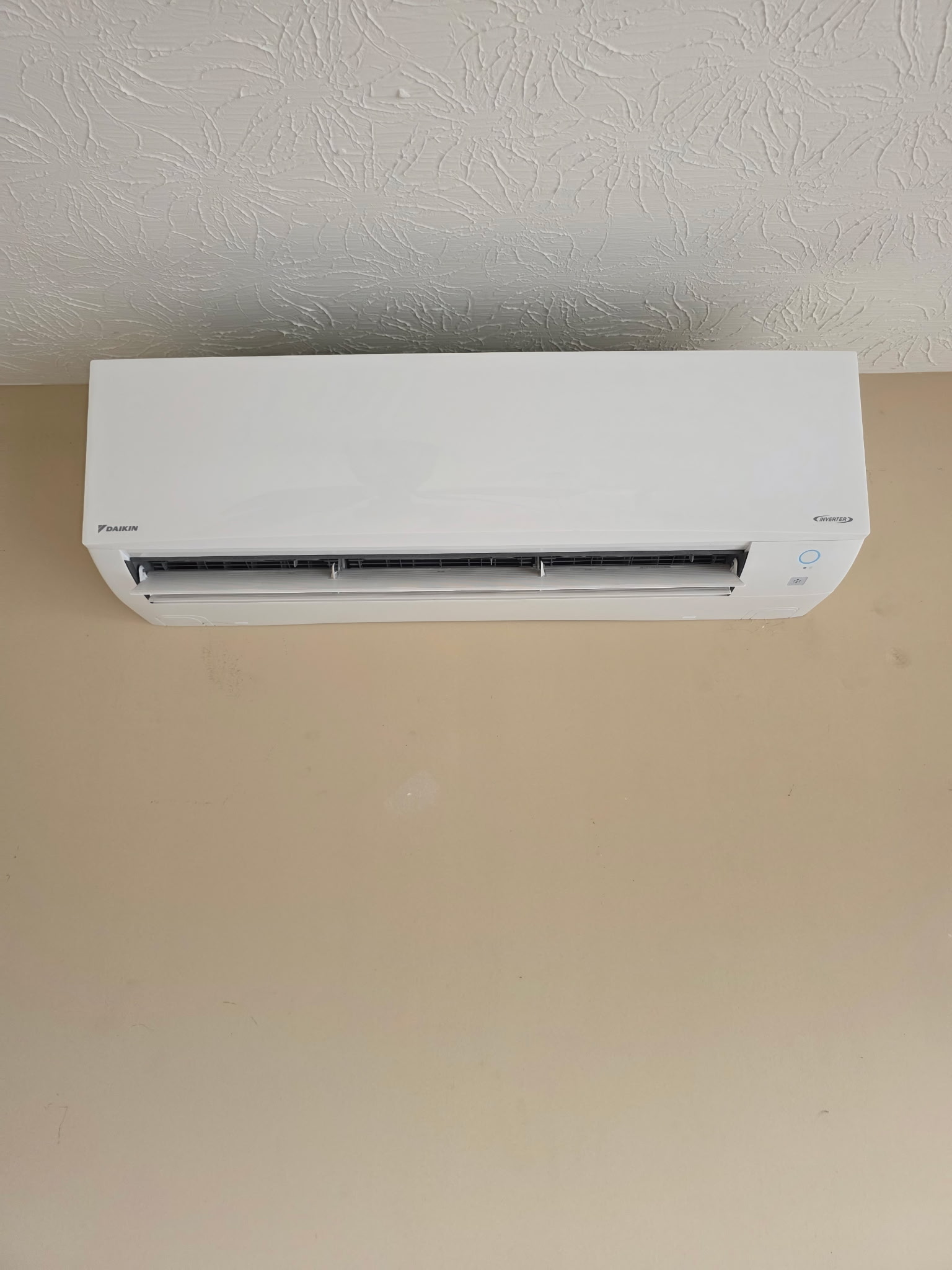 Daikin Inverter mini-split indoor wall unit installed on beige wall with clean finish southern Indiana